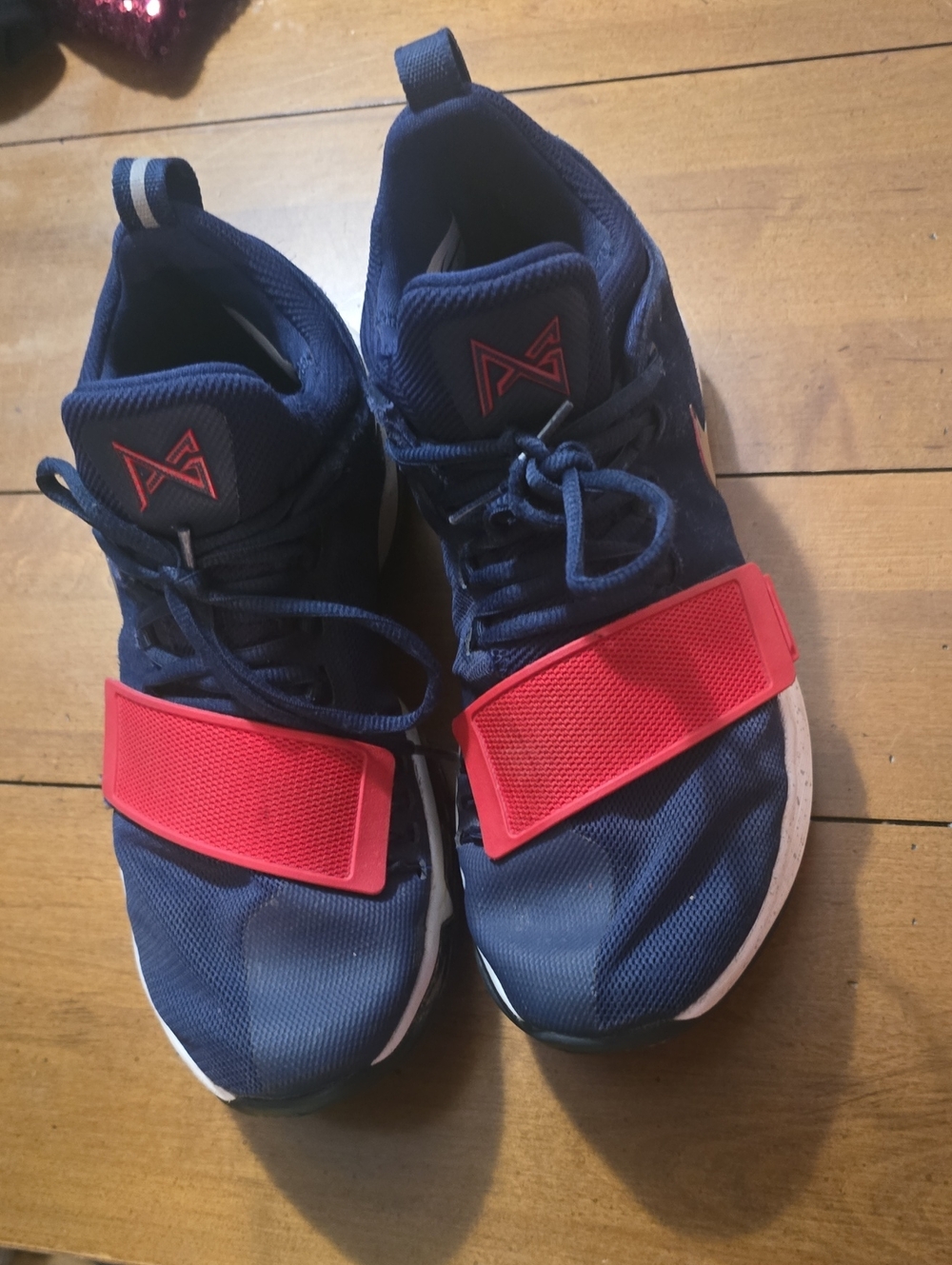 Nike Men's Navy Blue Athletic Shoes with Red Strap Accents